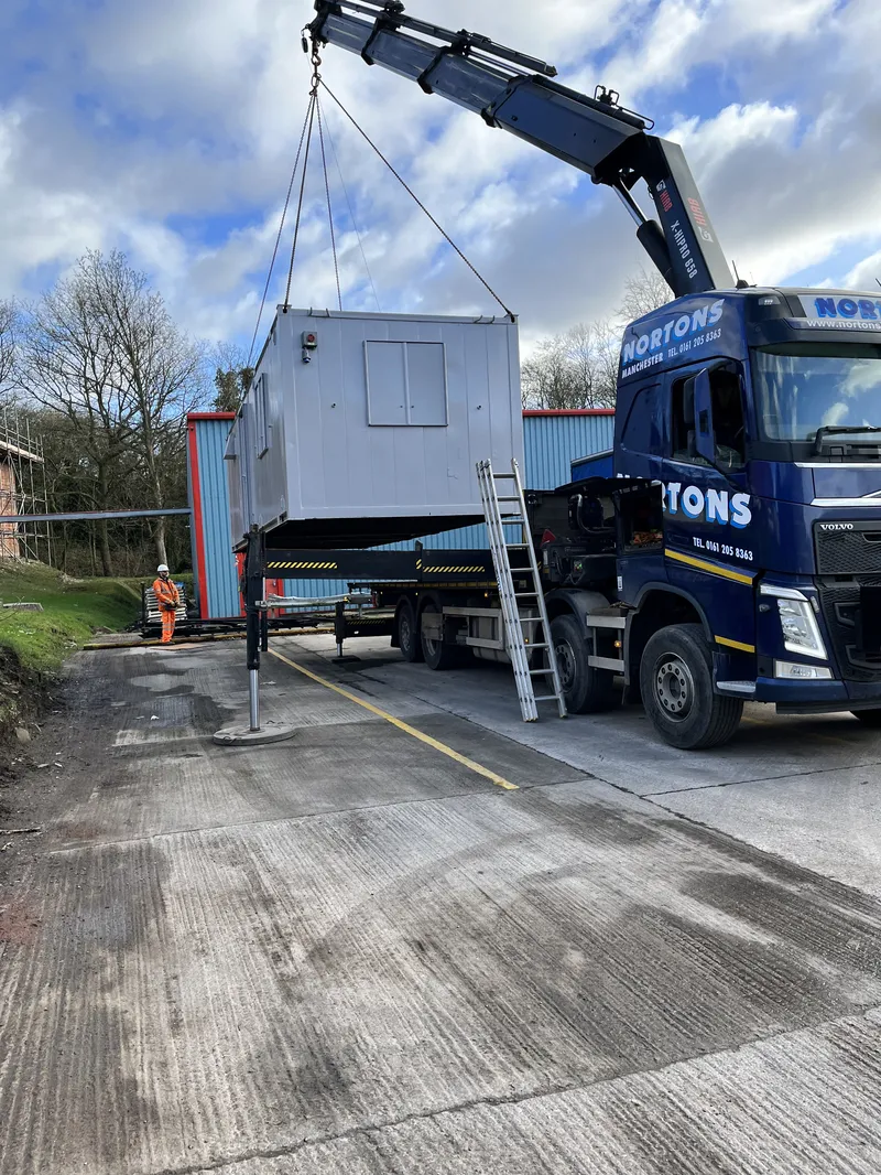 Shipping container delivered to site by HIAB UK
