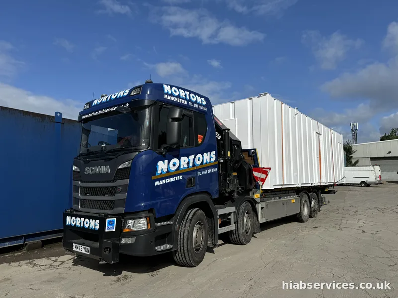 HIAB loading a container collection at the depot for nationwide delivery