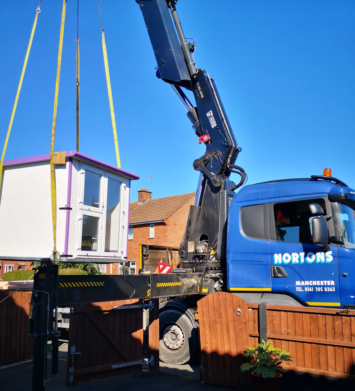 HIAB wagon and drag hauling a portable pod UK