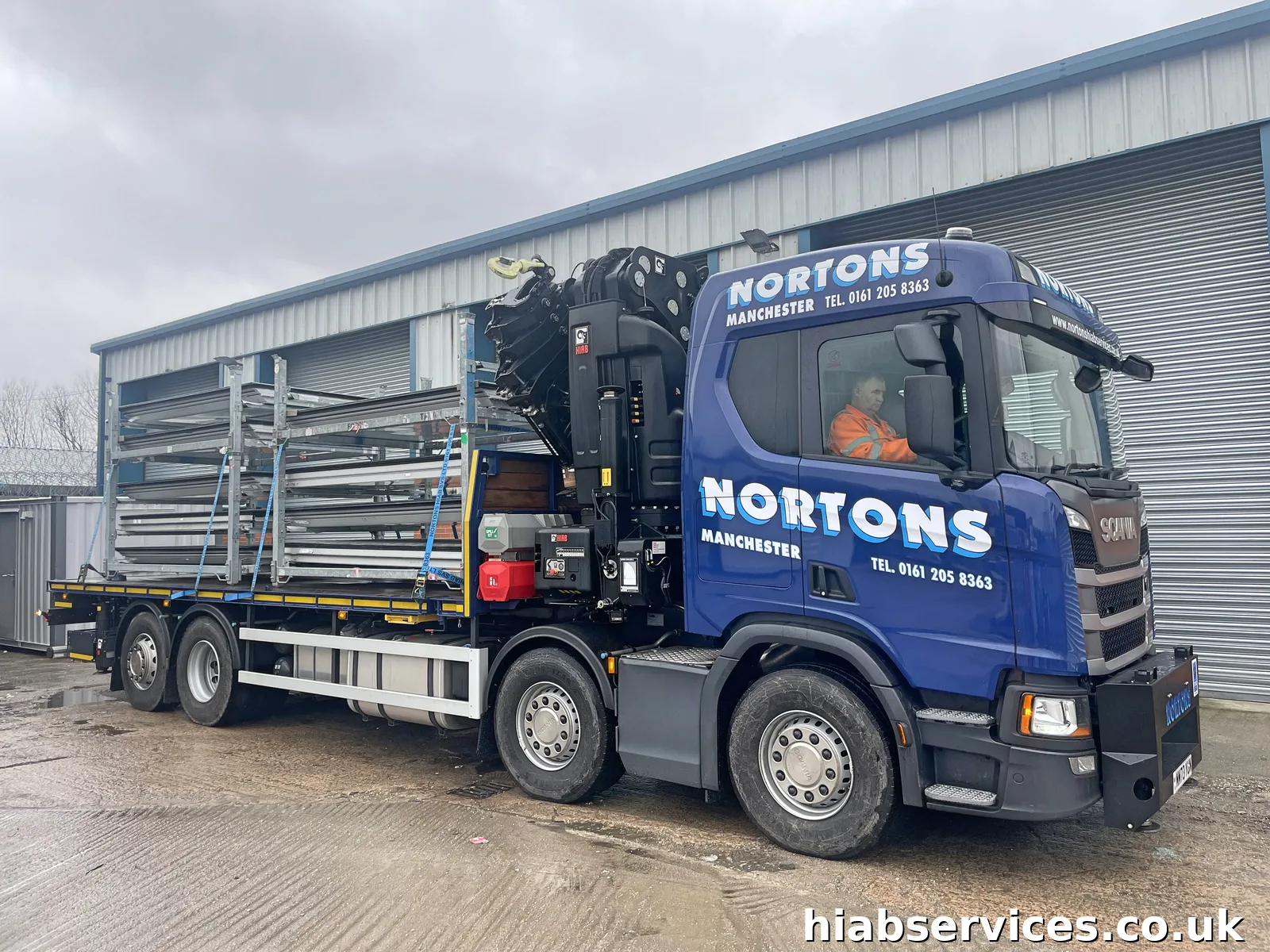 HIAB Services UK crane lorry fleet on the road