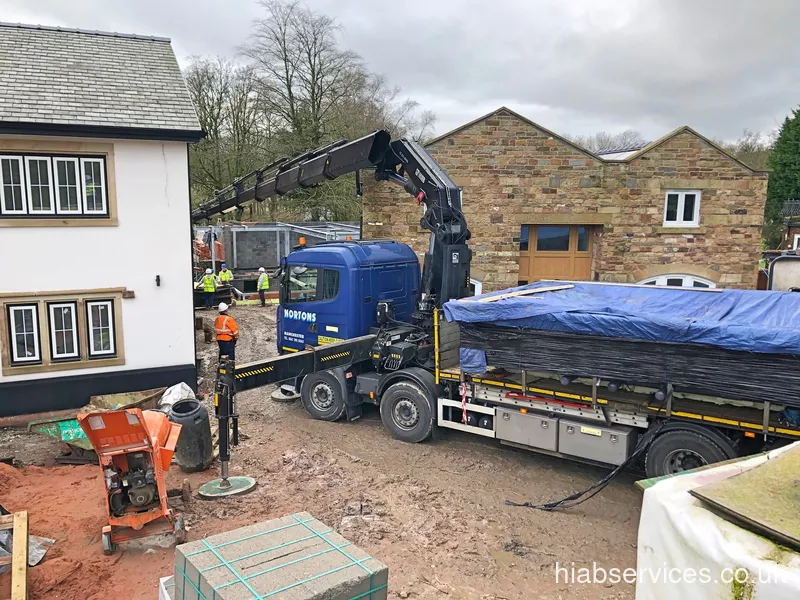 Long reach HIAB placing a load at distance UK
