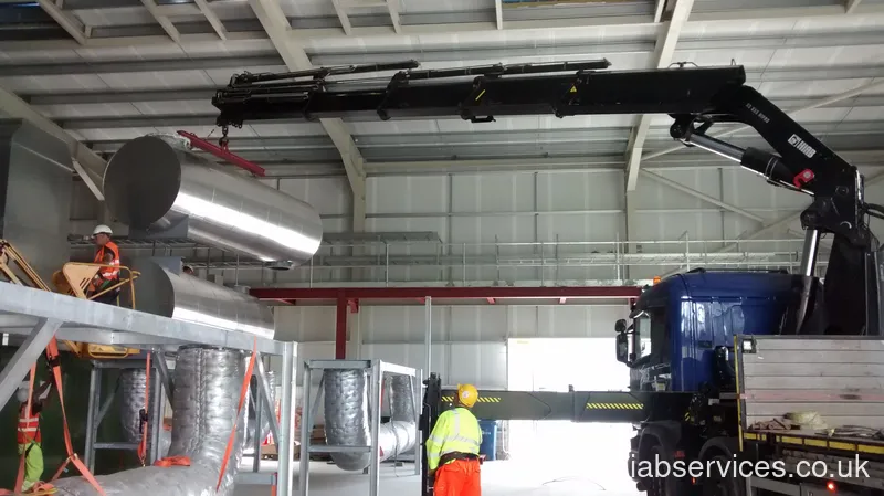 Long reach HIAB crane set up on outriggers UK